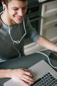 student having an online singing lessons