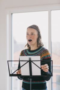 singing student practicing reading music